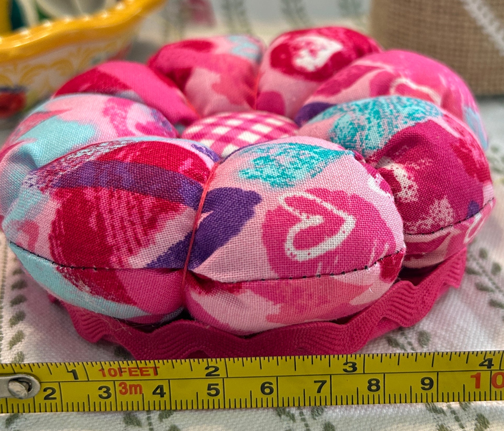 Pin Cushion with Pink, Purple, and Teal Hearts on wooden base